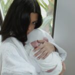 Kourtney Kardashian cradled her baby son Rocky in Mother's Day photos shared by Travis Barker