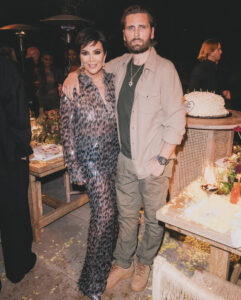 Kris Jenner flaunted her slimmer figure in a sheer dress in a new photo with Scott Disick