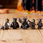 A line of Lego minifigs from Lord of the Rings, including Gollum, Frodo, Sam, Sauron, and various orcs