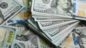 stack of american hundred dollar bills