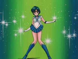 Sailor Mercury posing dramatically in front of a green background studded with sparkling lights in Sailor Moon.