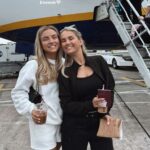 Molly posed with her sister Zoe outside their Ryanair flight