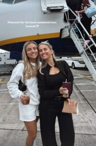 Molly posed with her sister Zoe outside their Ryanair flight