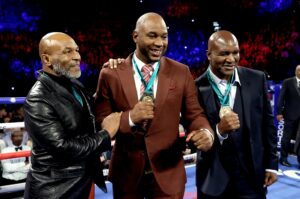 Mike Tyson, Lennox Lewis and Evander Holyfield pictured in 2020