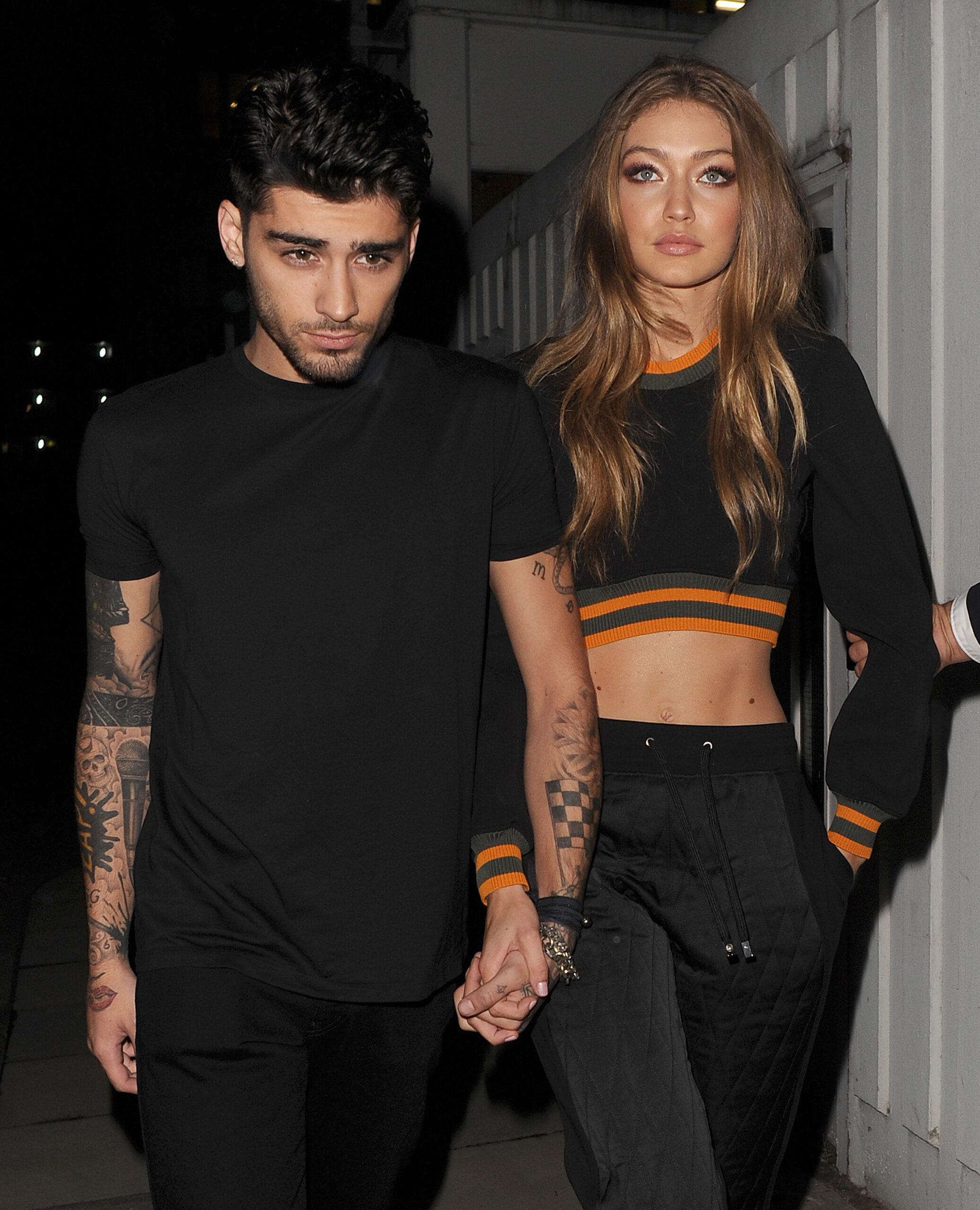 Zayn Malik and Gigi Hadid leaving the Versus Versace Show