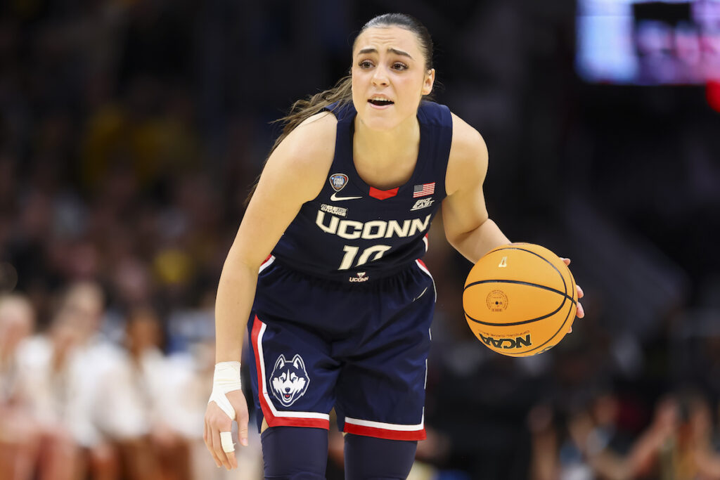 WNBA Star Nika Mühl In Workout Gear Poses On Seattle Storm Court