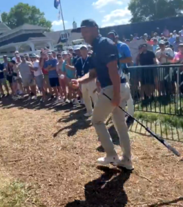DeChambeau attempted to throw his ball to a kid in the crowd