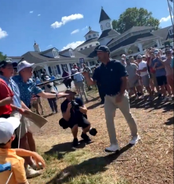 DeChambeau angrily pointed his club at the fan