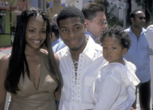 Kel Mitchell, Tyisha Hampton and their child attend The Adventures of Rocky & Bullwinkle on June 24, 2000, at Universal City Walk 18 Theatres in Universal City, California