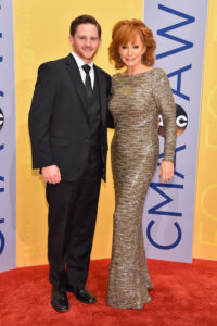 Shelby Blackstock and Reba McEntire at the 50th annual CMA Awards at the Bridgestone Arena in Nashville, Tennessee, on November 2, 2016