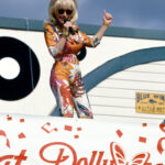 Dolly Parton singing during the 10th Anniversary of her Dollywood theme park in April, 1995