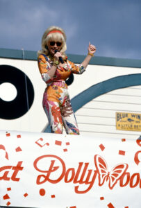Dolly Parton singing during the 10th Anniversary of her Dollywood theme park in April, 1995