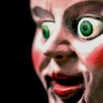 Creepy clown doll head