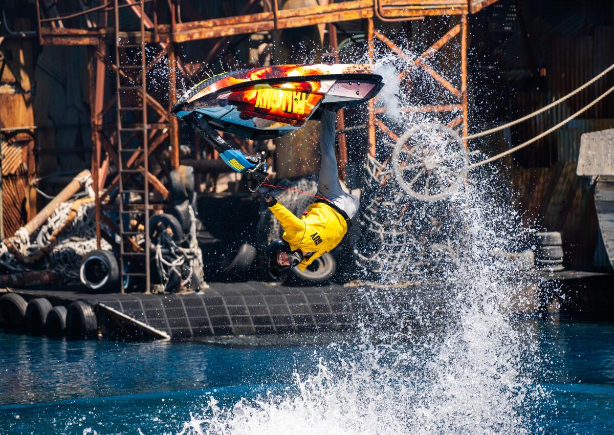 A stunt performer flips during "The Fall Guy Stuntacular Pre-Show" at Universal Studios Hollywood.