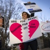 Penny Harrison and her son Parker Harrison rally against the live entertainment ticket industry outside the U.S. Capitol last year.