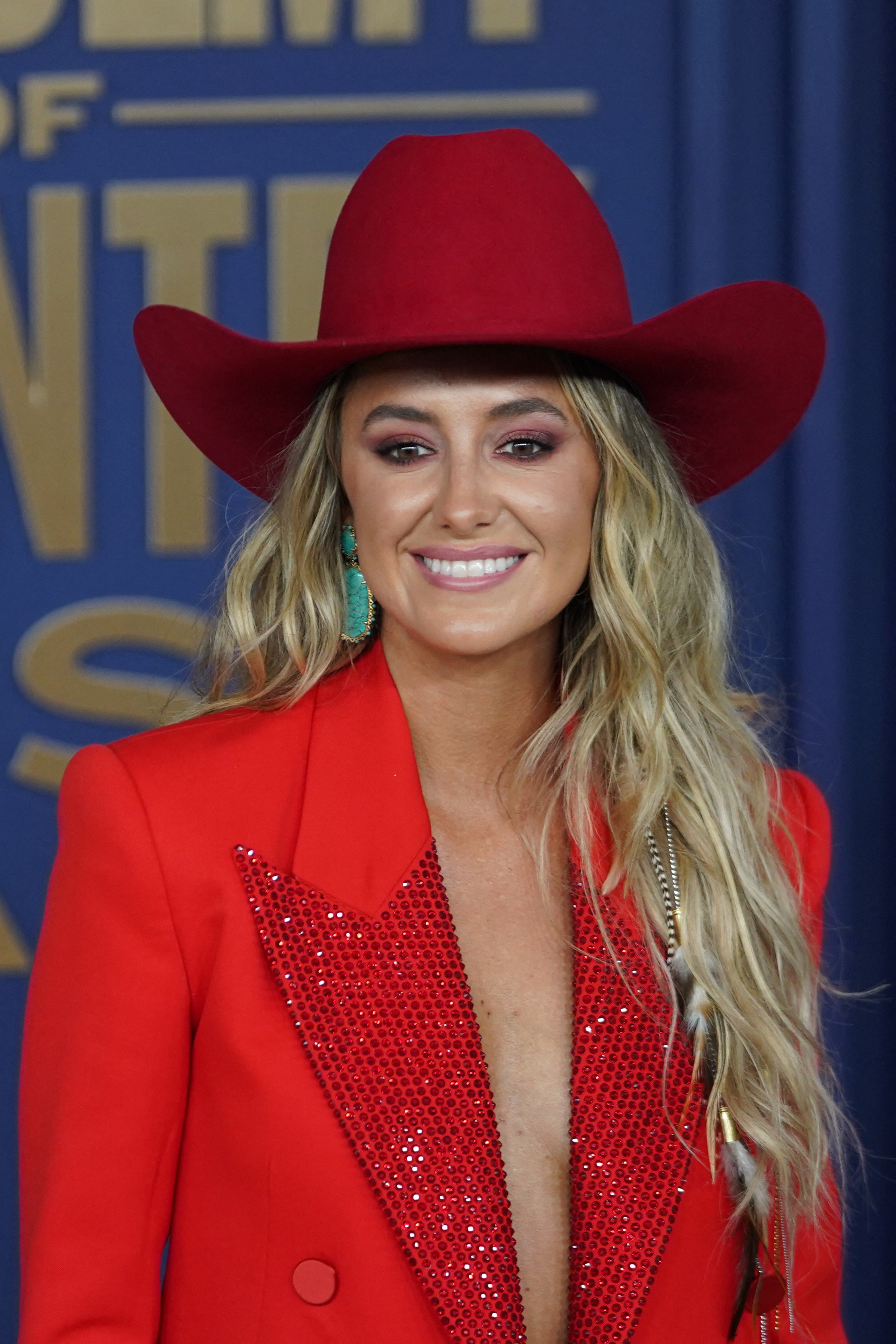 Some fans debunked the Beyonce theory and believed the teaser photo more closely resembled country star Lainey Wilson from behind