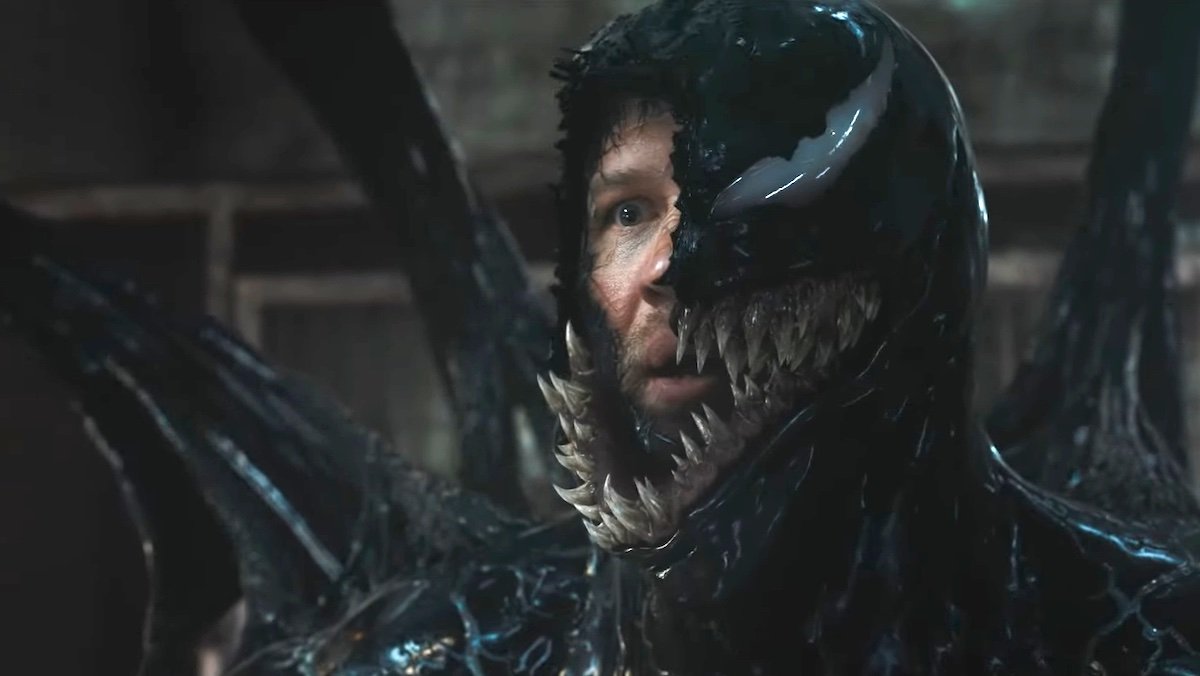 Eddie Brock's face partly shown coming out of Venom's body in Venom: The Last Dance