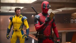 Deadpool and Wolverine looking at tempad