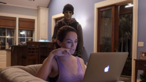 Kate Siegel is unknowingly stalked by a masked killer in Hush.