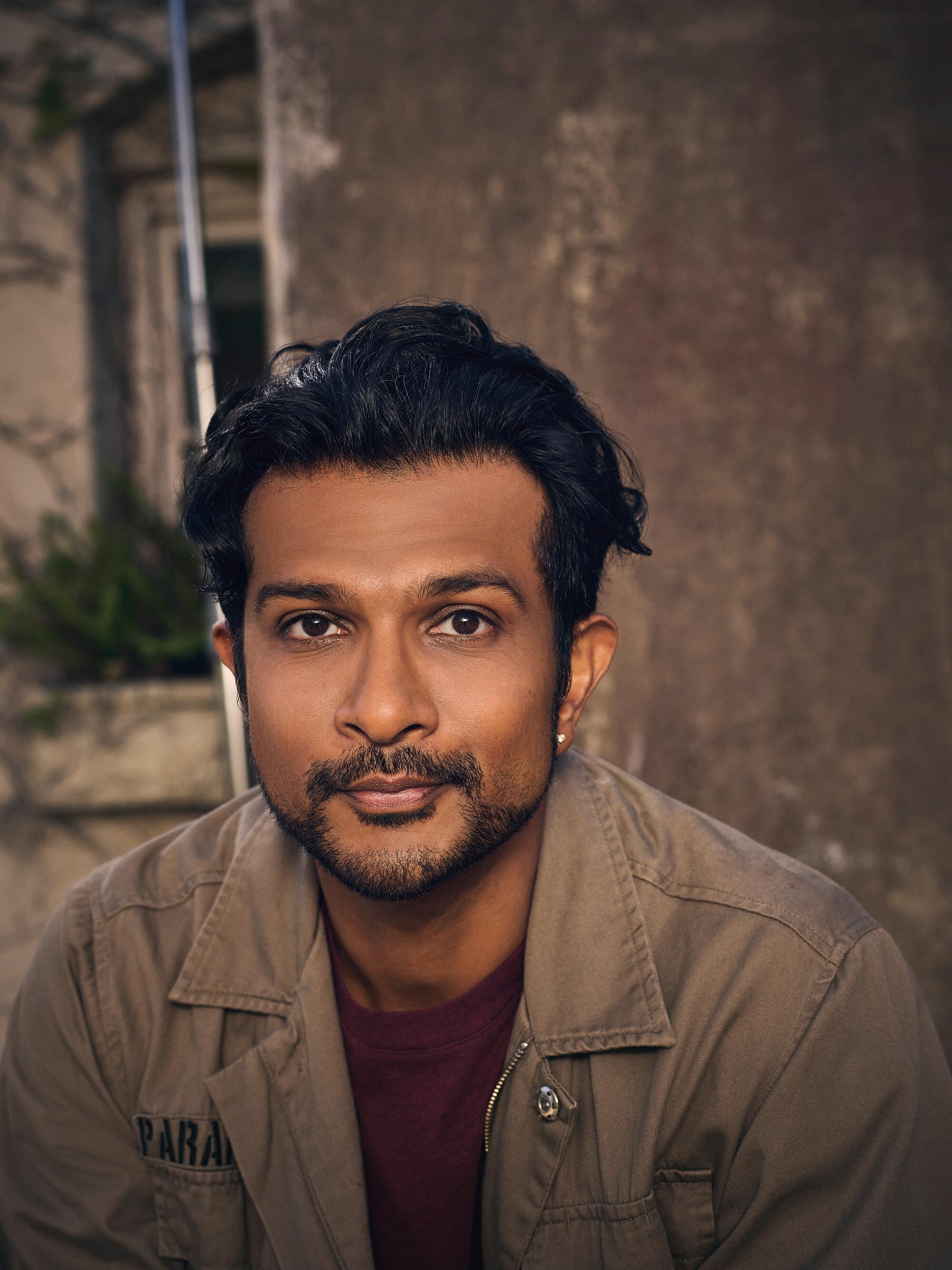 Utkarsh Ambudkar poses for a portrait.