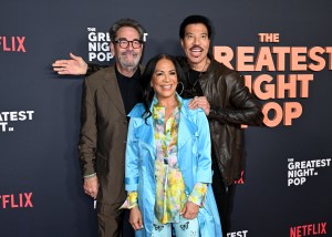 Huey Lewis, Sheila E. and Lionel Richie at the premiere of 