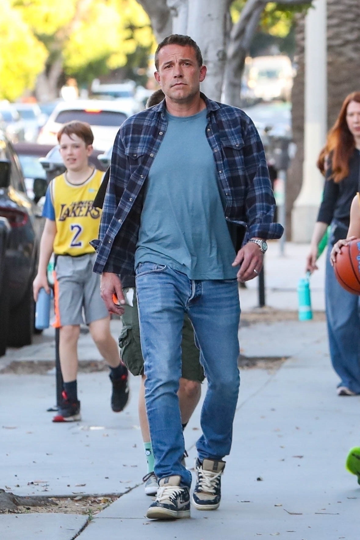 Ben was also seen wearing his wedding band while picking his son up from basketball practice in another part of town
