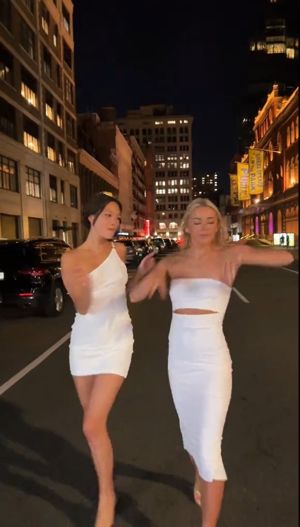 Dunne and the TikTok star both wore white outfits as they danced in the streets of New York City