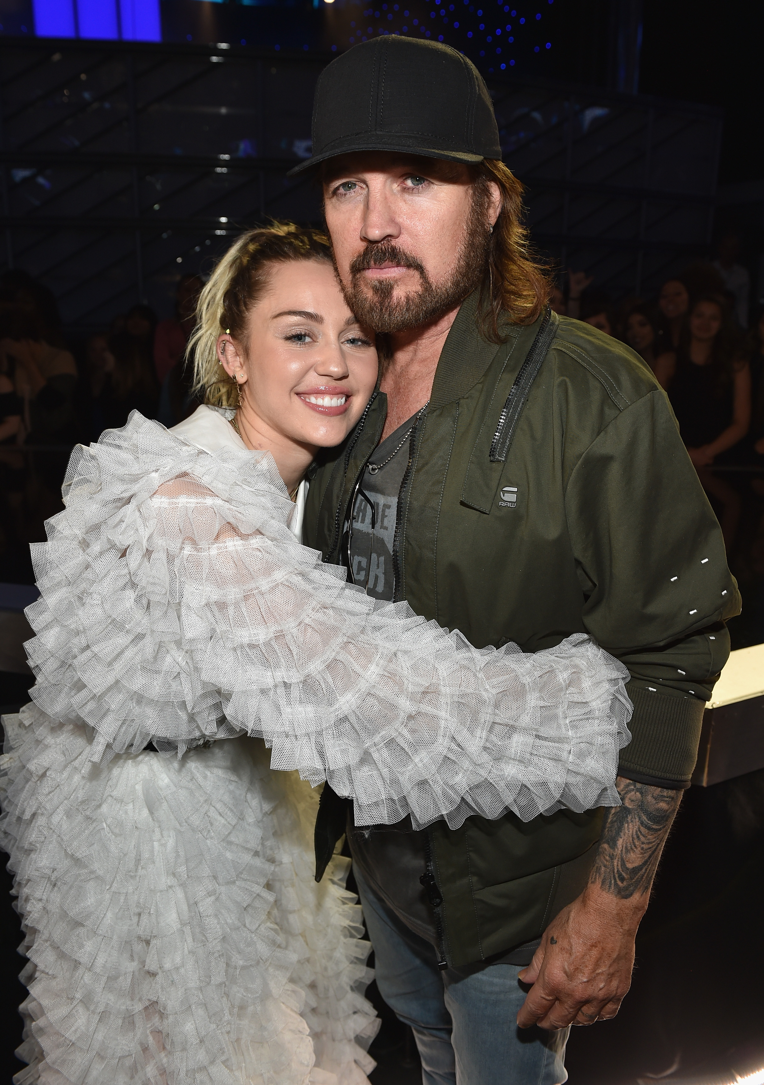 Miley thinks that her dad's divorce will bring peace to the family and is a step in the right direction for Billy Ray