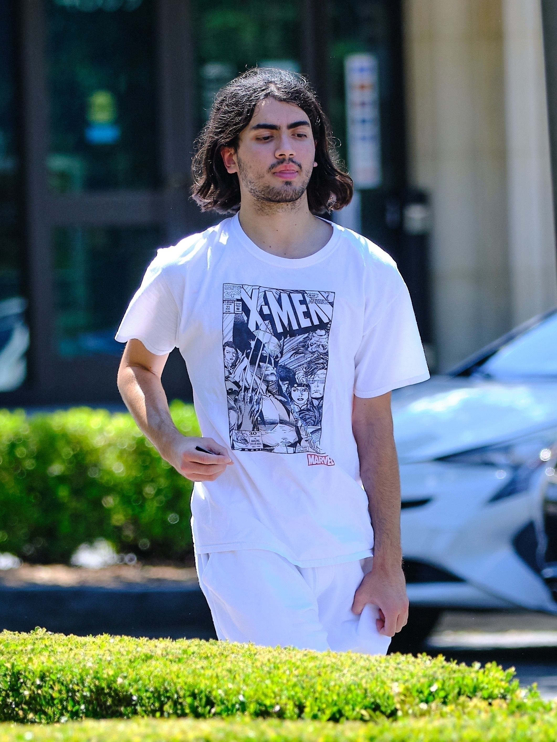 Blanket's brunette locks flowed to his shoulders and he rocked some facial hair