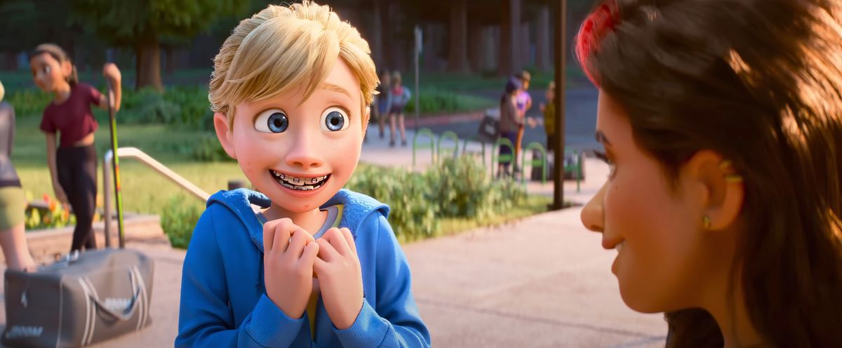 13-year-old Riley grins awkwardly and clutches at her own shirt collar as she meets Val, her hockey-team idol, in Pixar Animation Studios’ Inside Out 2