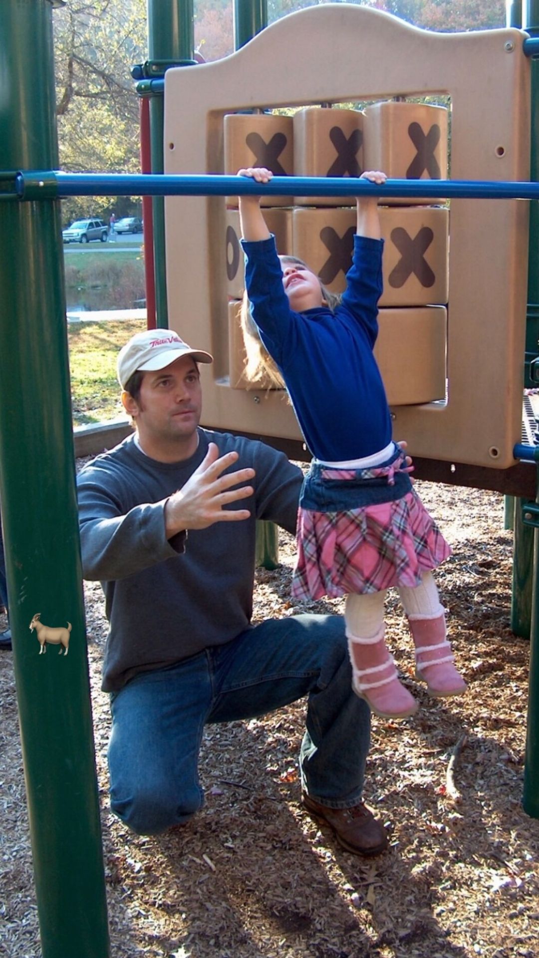 Olivia also posted a picture of her younger self with her dad while at the playground