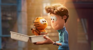 From left to right: Garfield (voiced by Chris Pratt) and John Arbuckle (voiced by Nicholas Hoult) in 'The Garfield Movie.'