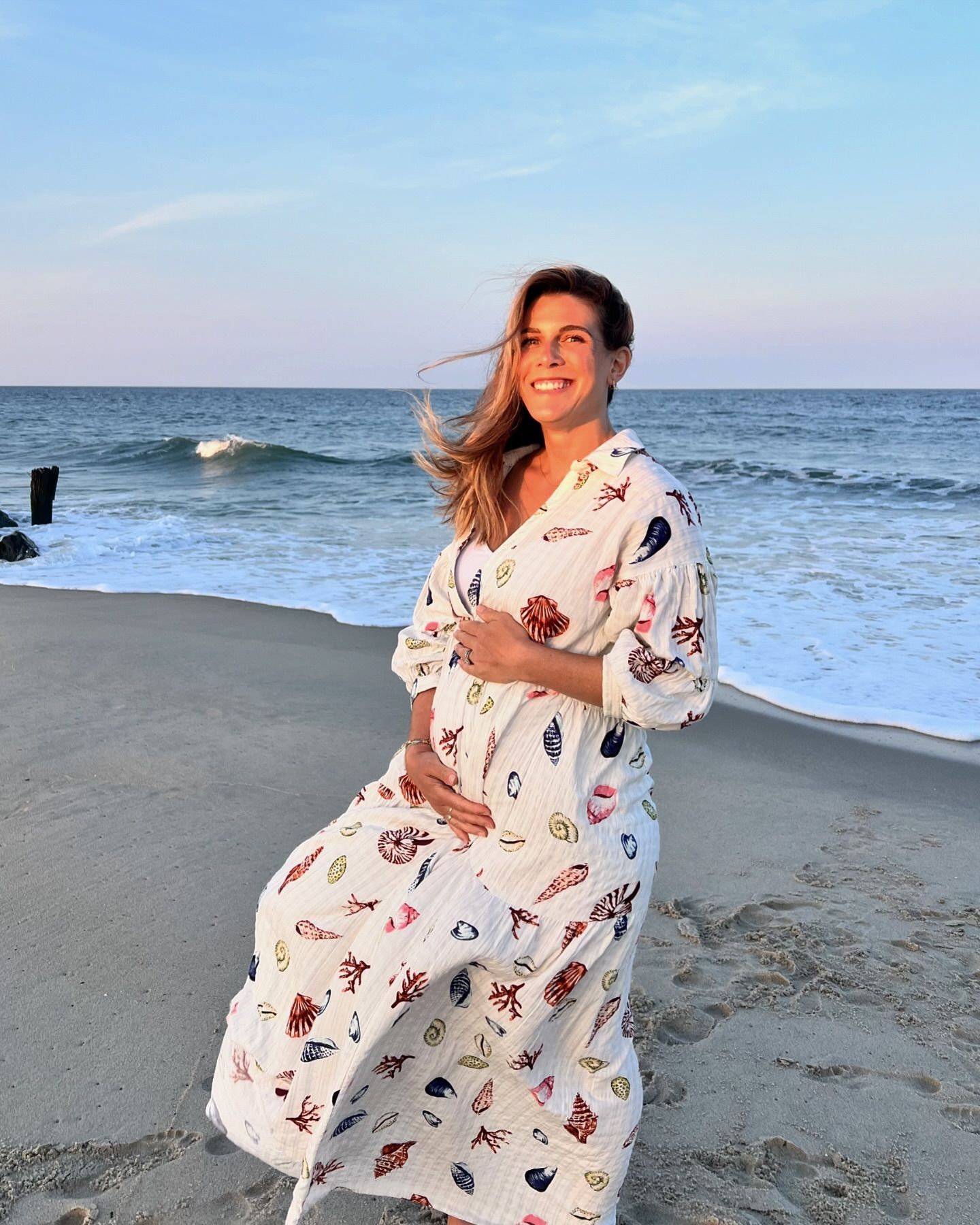 Theresa Nist's daughter Jen announced her pregnancy with a beach photoshoot