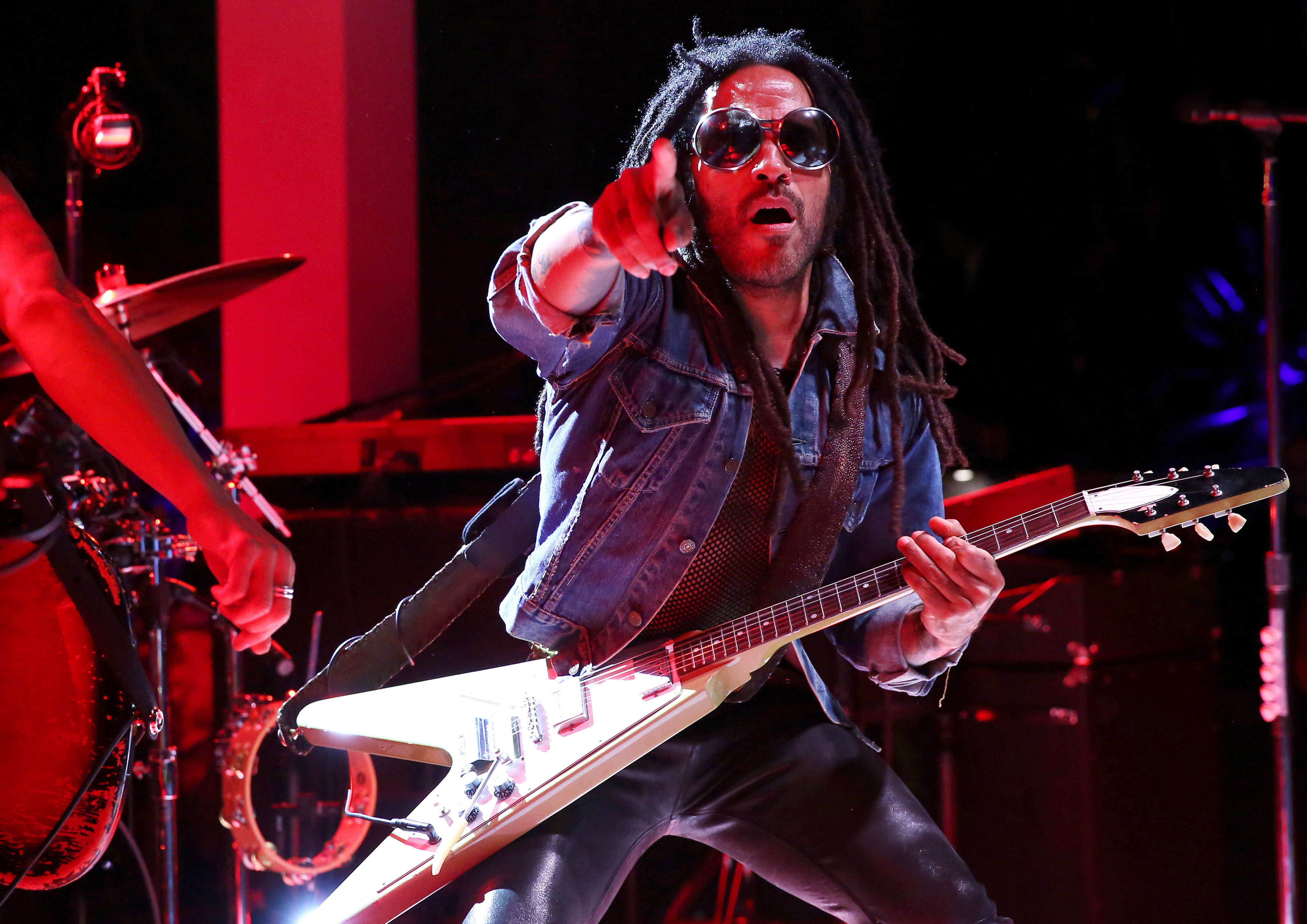 Lenny Kravitz on stage at a dinner party hosted by IHeartMedia and MediaLink