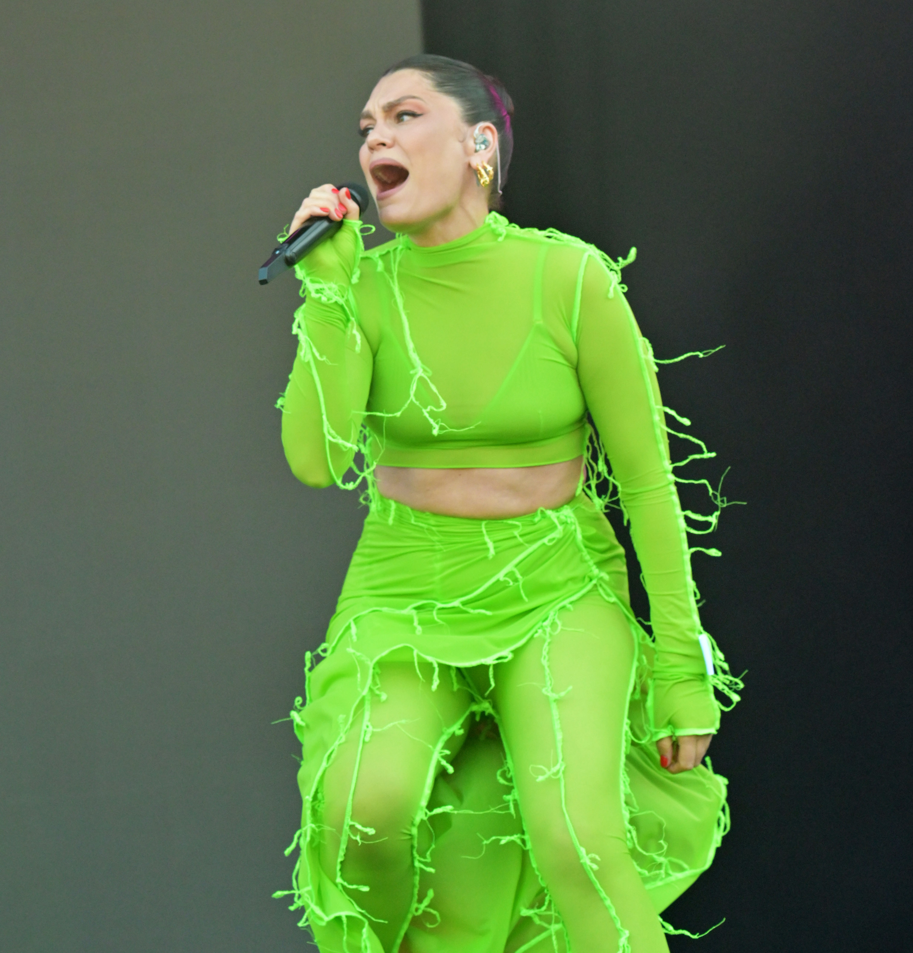 And Jessie J wore this neon-green sheer outfit on stage