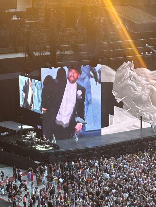 Travis Kelce - donning a tuxedo - has never joined the star on-stage