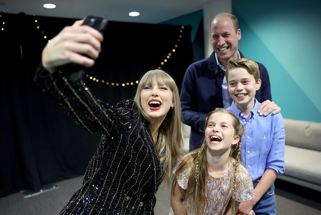 Pop queen Taylor Swift takes a selfie with Prince William, George and Charlotte