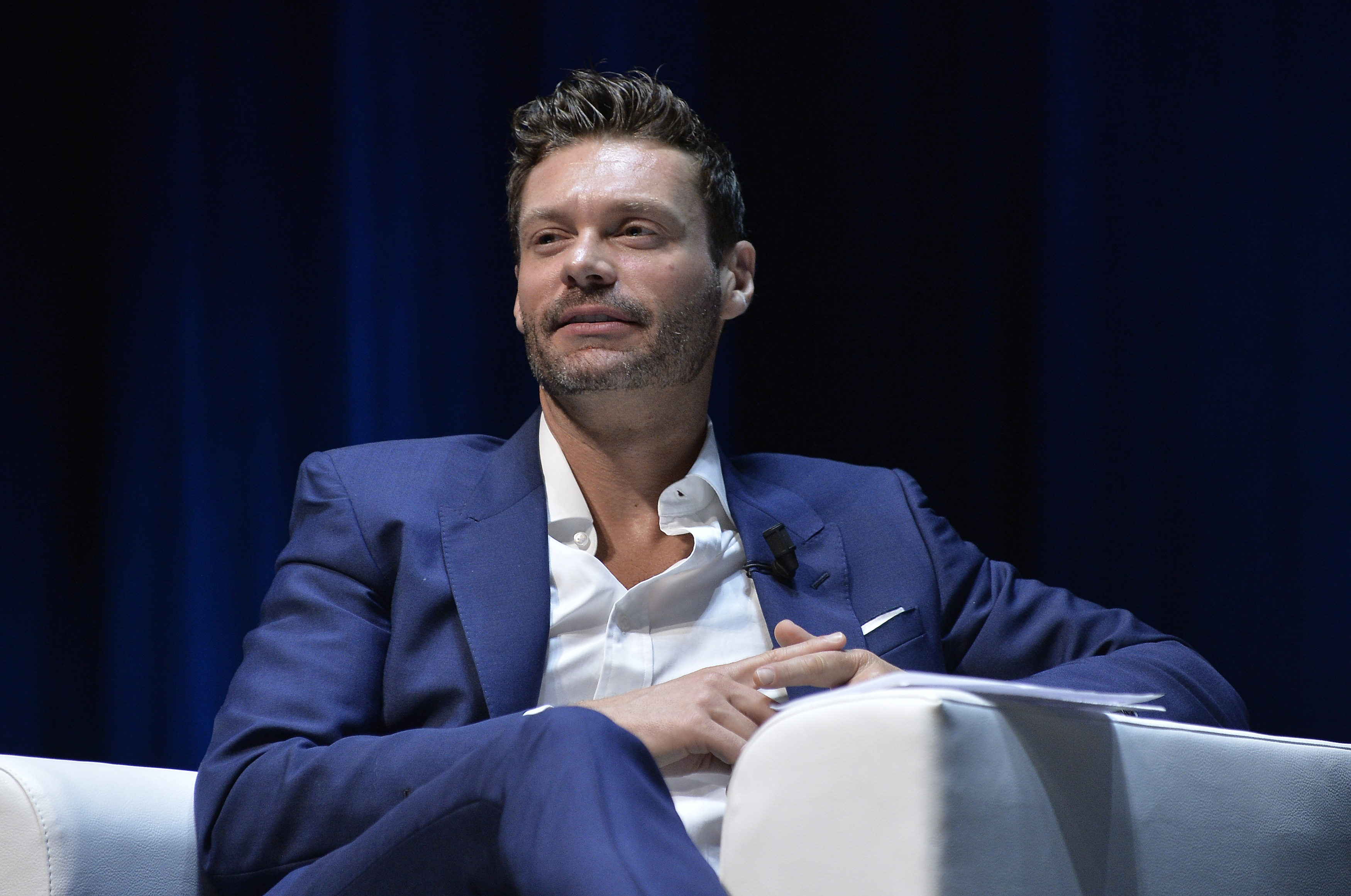Ryan Seacrest was seemingly decades younger in the Summer-themed snap