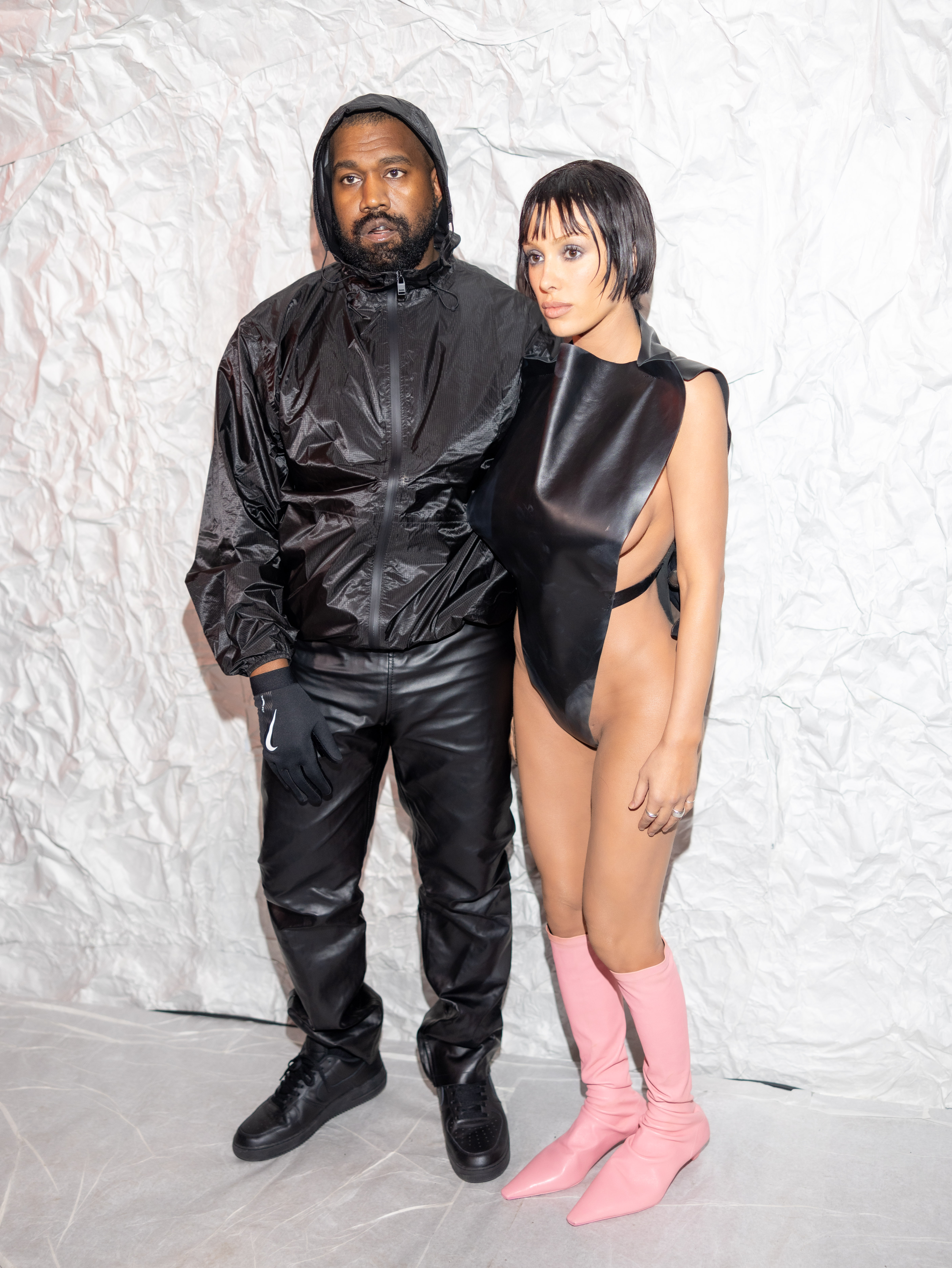 Above, Kanye West and Bianca Censori attended the Marni fashion show in Milan in February 2024