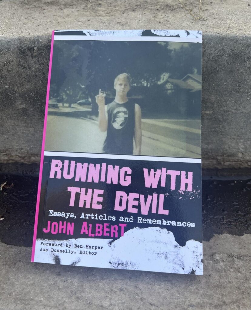 Book cover of "Running With the Devil" by John Albert