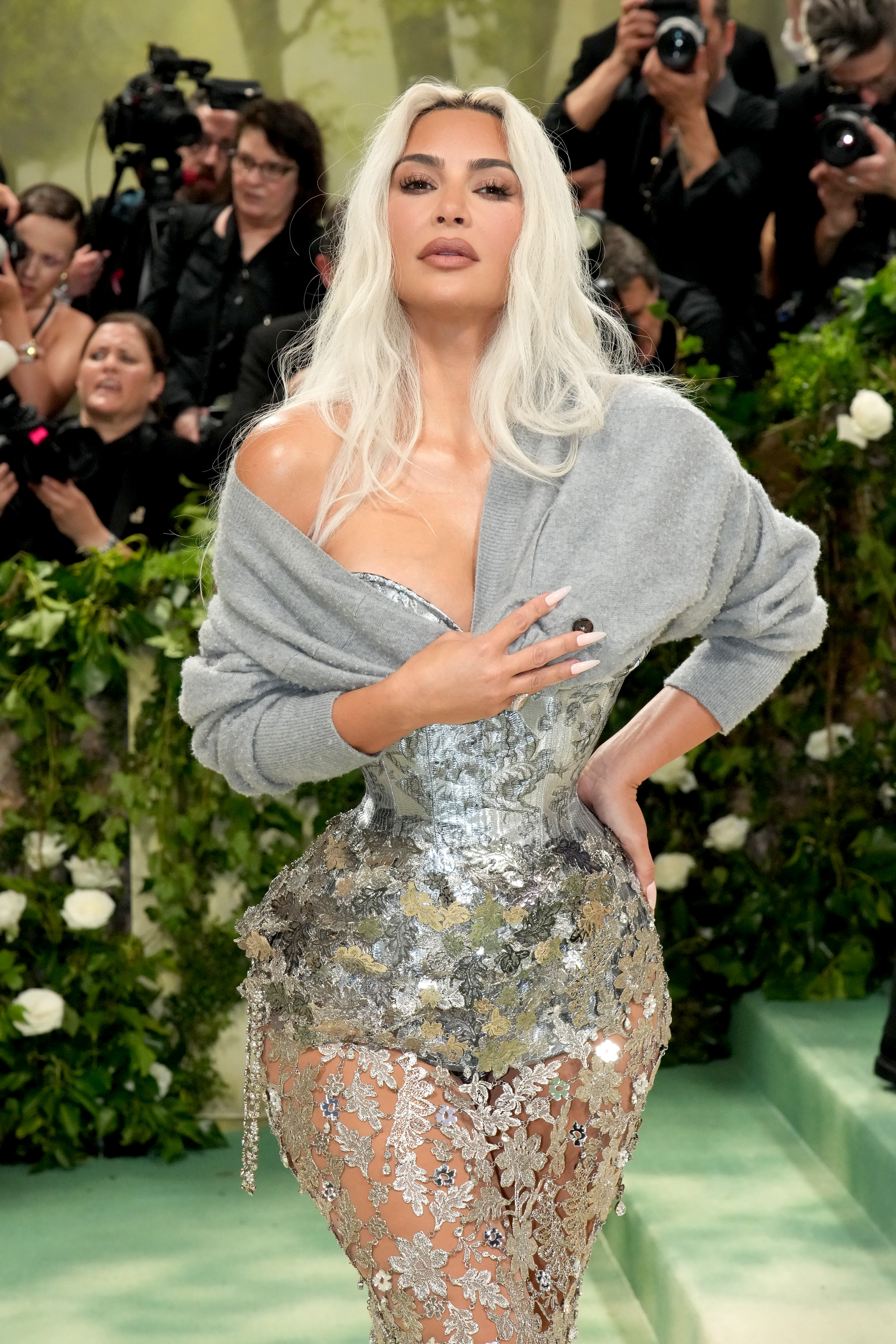 The Kardashian momager's fans claim she looks younger than Kim Kardashian, seen in this photo at the 2024 Met Gala