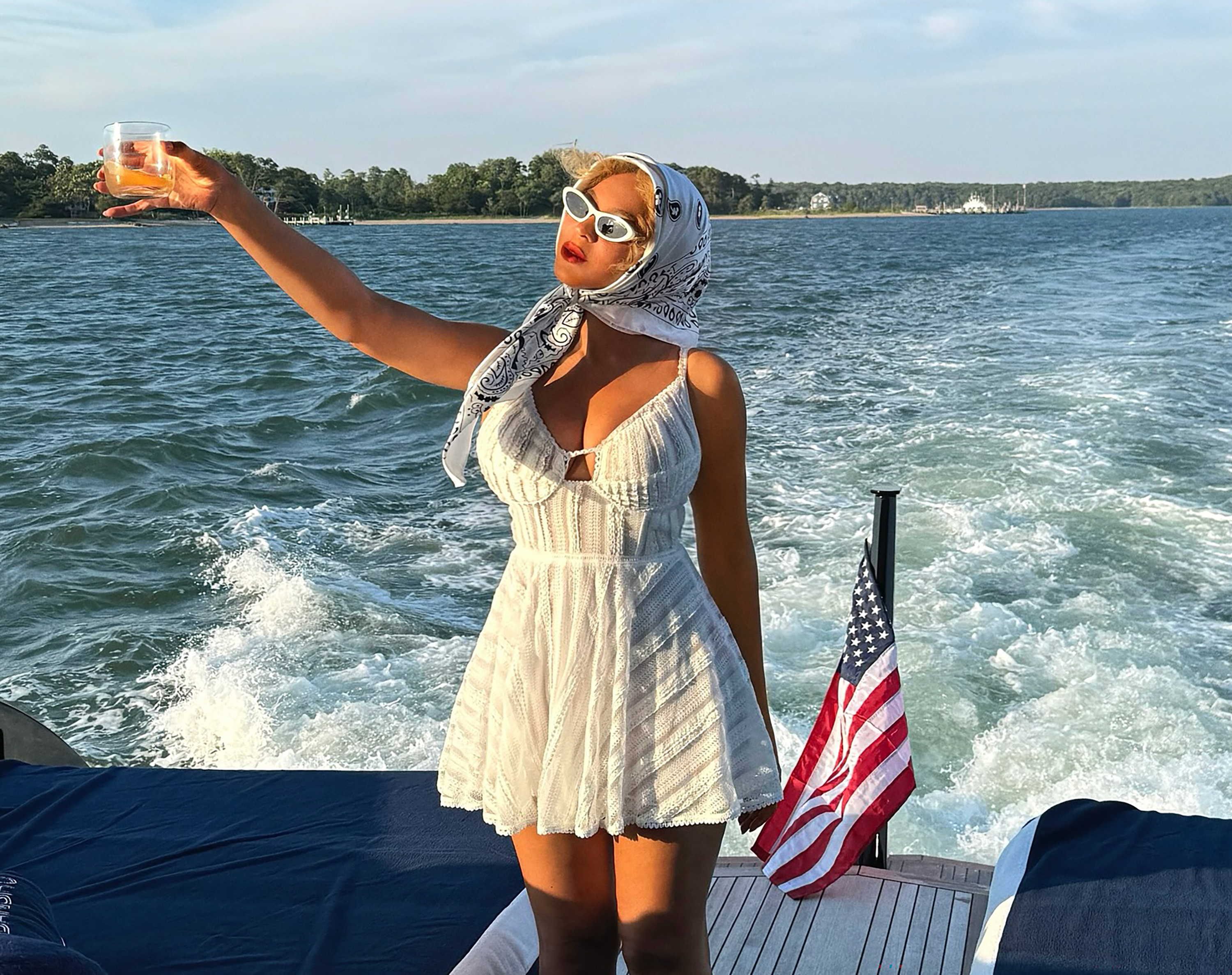 Beyonce held a drink in her hand while visiting US seaside resort the Hamptons