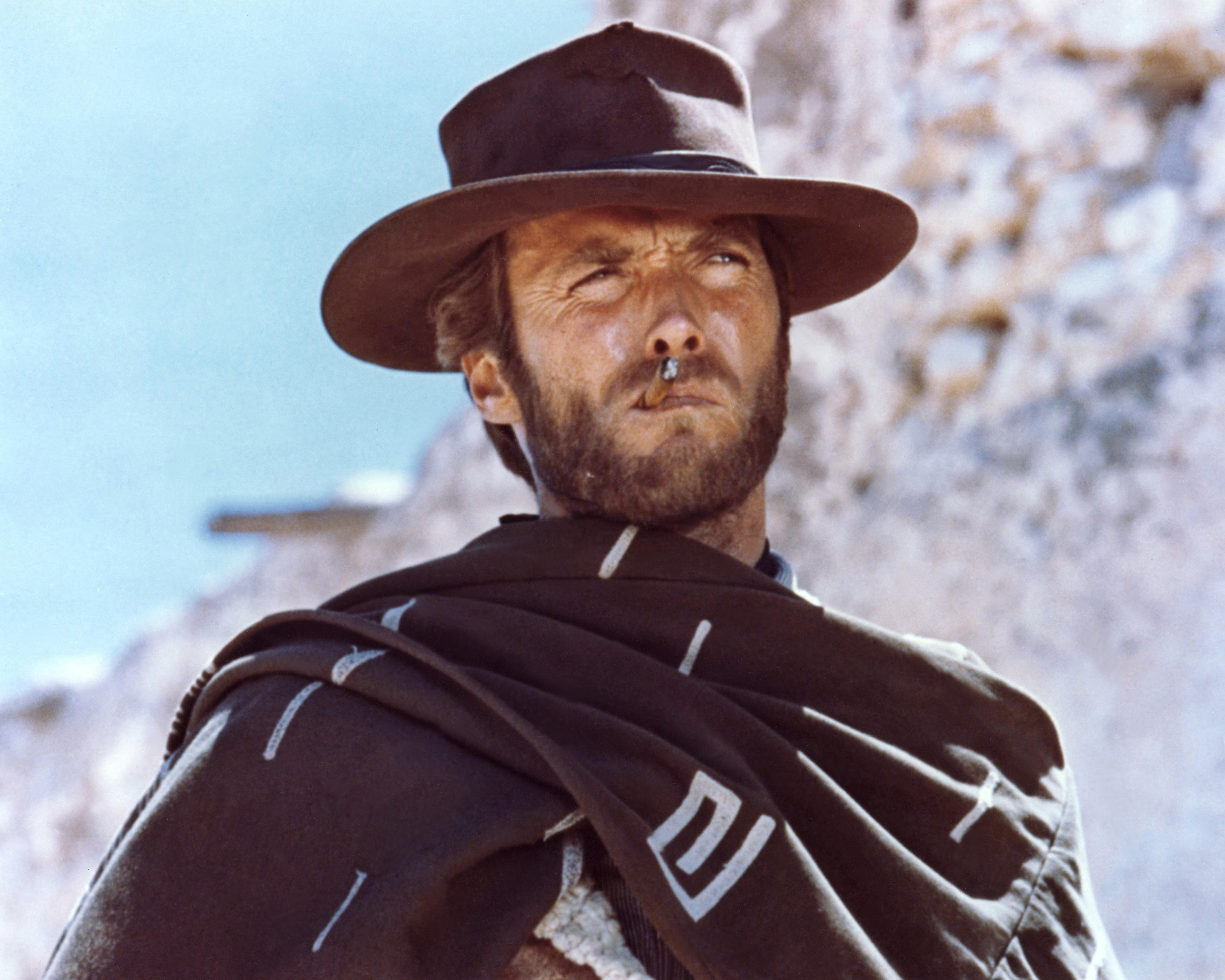 Clint Eastwood, seen here in the 1965 film For a Few Dollars More, is known for his iconic roles in Westerns, including The Good, The Bad and the Ugly (1966)