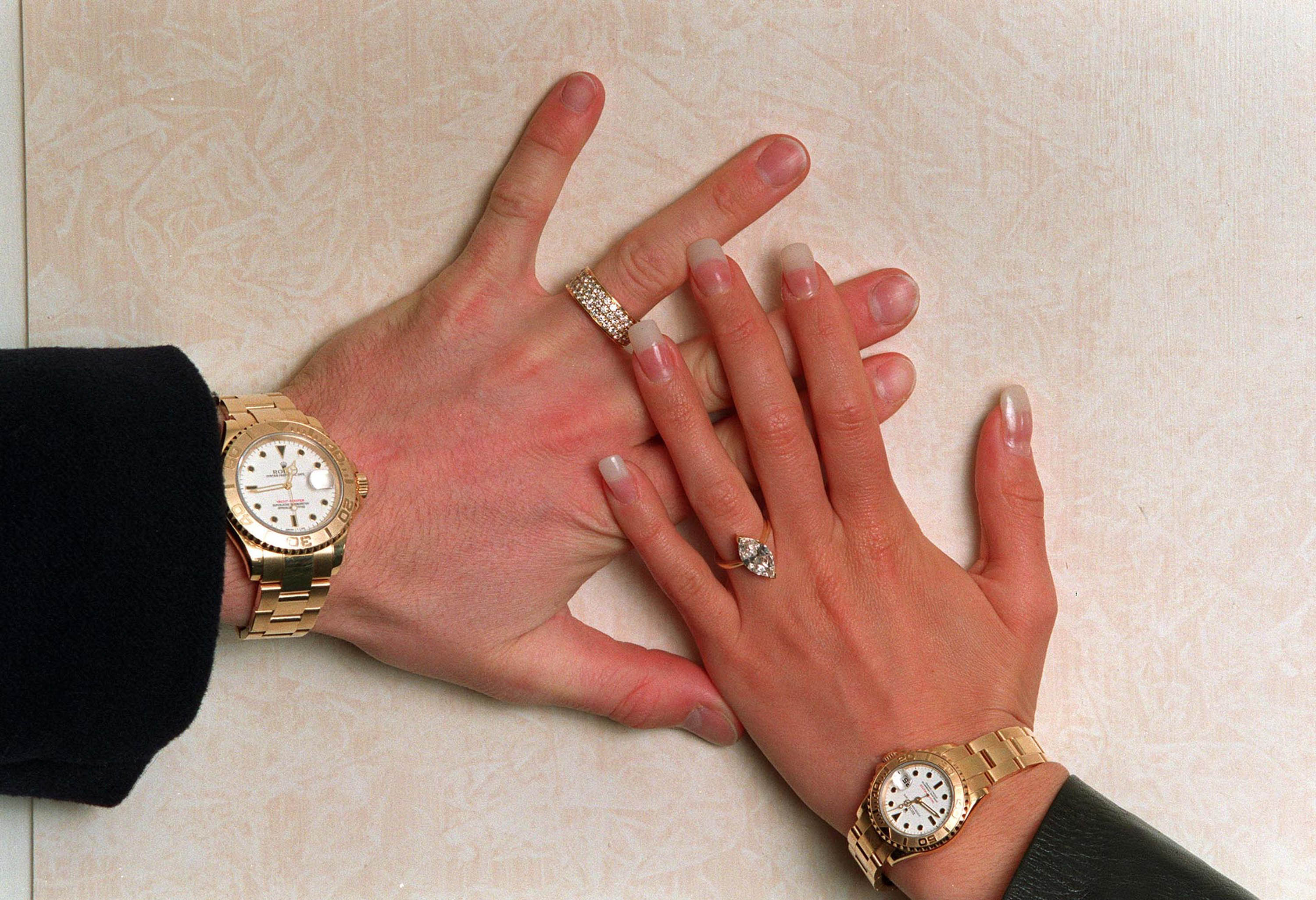 Posh and Becks announce their engagement with this picture of the rings in 1998