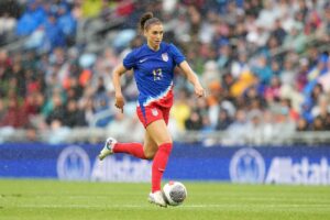 Alex Morgan playing for the US
