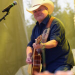 Country singer Mark Chesnutt performing at Country Thunder in Wisconsin in July 2018
