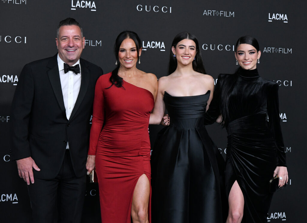 The D'Amelio family posing at a red carpet event in November 2021