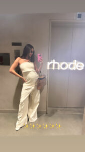 Hailey Bieber showed off her baby bump during a visit to the Rhode office