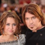 Miley Cyrus and her father, Billy Ray Cyrus, arrive at the film premiere of "Hannah Montana: The Movie" on April 23, 2009, in London.