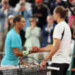 Alexander Zverev shaking hands with Rafa Nadal after becoming the fourth player to beat the legend in the French Open